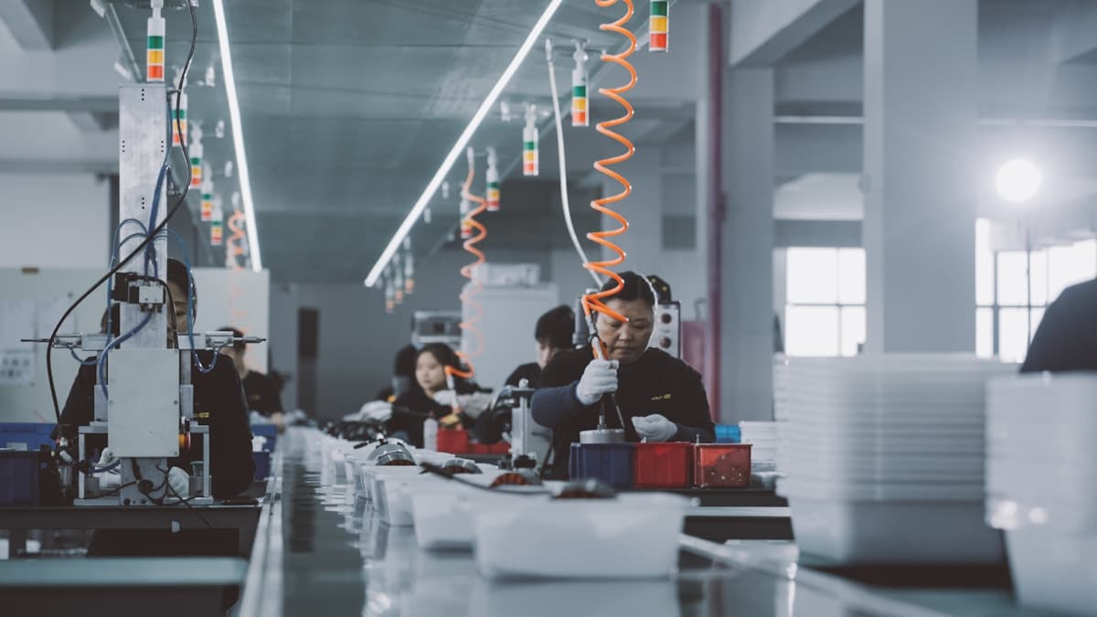 Electronics assembly line workers